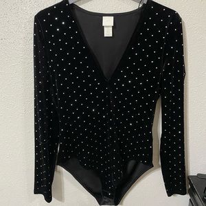 H&M body suit
Color: Black top bedazzled
Size: Medium